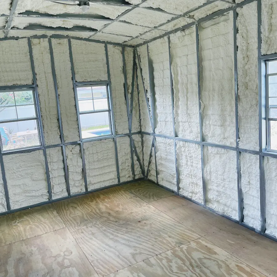 Closed-cell spray foam insulation applied to wall cavities in a residential project in Cedartown